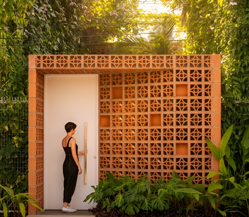 Decorative terracotta facade screen wall showcasing sustainable exterior cladding for contemporary architecture.