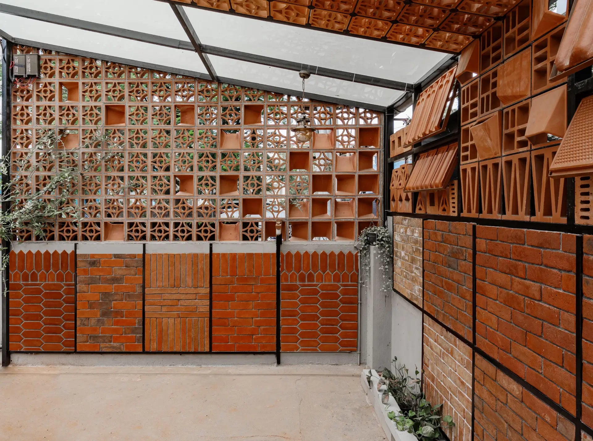 Modern architectural interior with brick walls and decorative wooden panels.